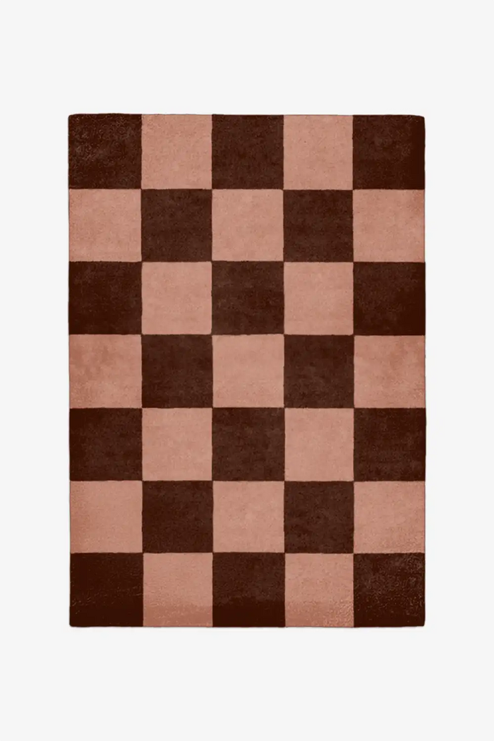 Brown and tan wool rug with checkered pattern and modern edge