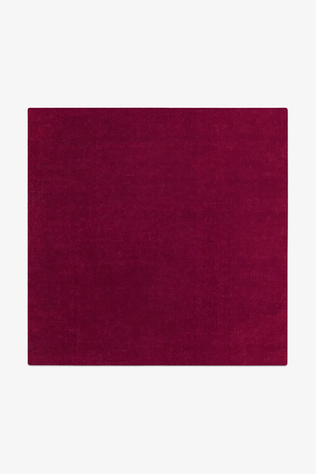 Solid burgundy rug on a white background