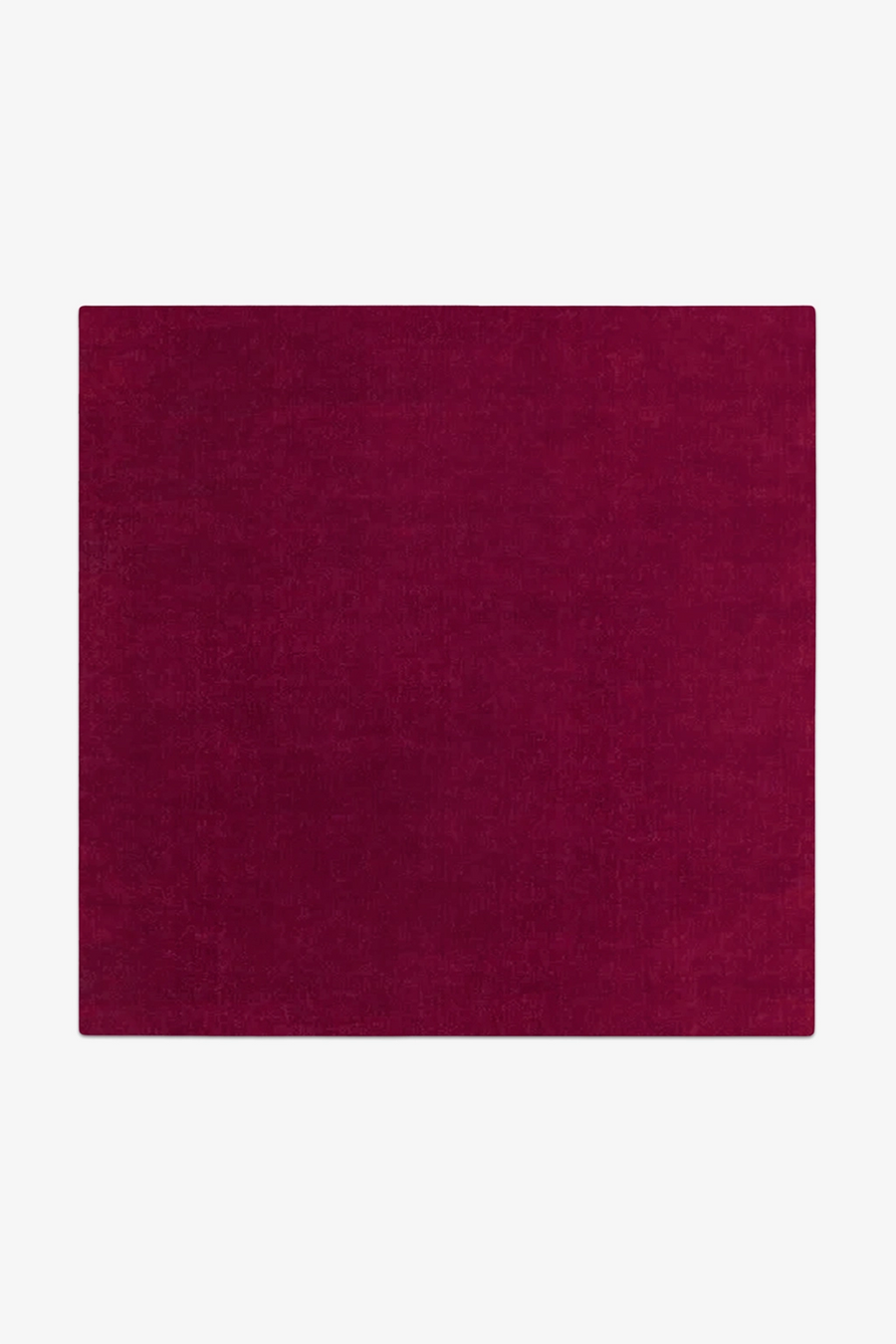 Solid burgundy rug on a white background