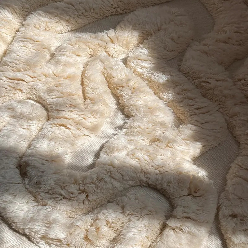 Deep pile texture of a Rolling Tides hand-knotted shag wool rug