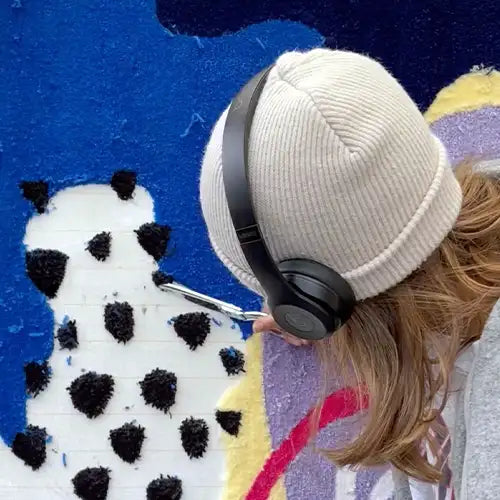 jubi rugs founder cassie dagostino carving a unique rug