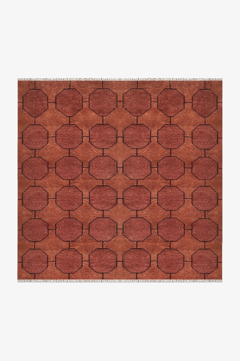 deep rust chestnut geometric square patterned rug on a white background | 6x6