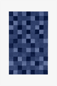 Navy and black checkered custom wool rug for bold, modern interiors 8x10