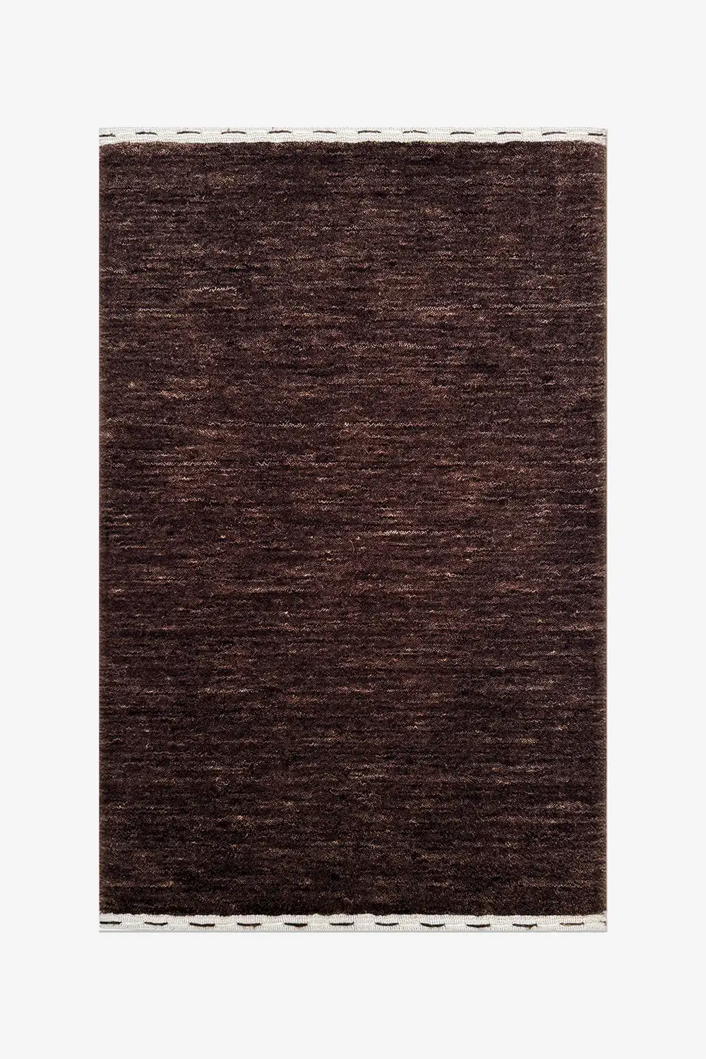 dark chocolate brown textured wool rug on a white background