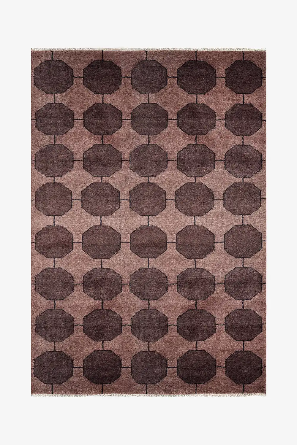 dark brown patterned rug with geometric design on a plain background