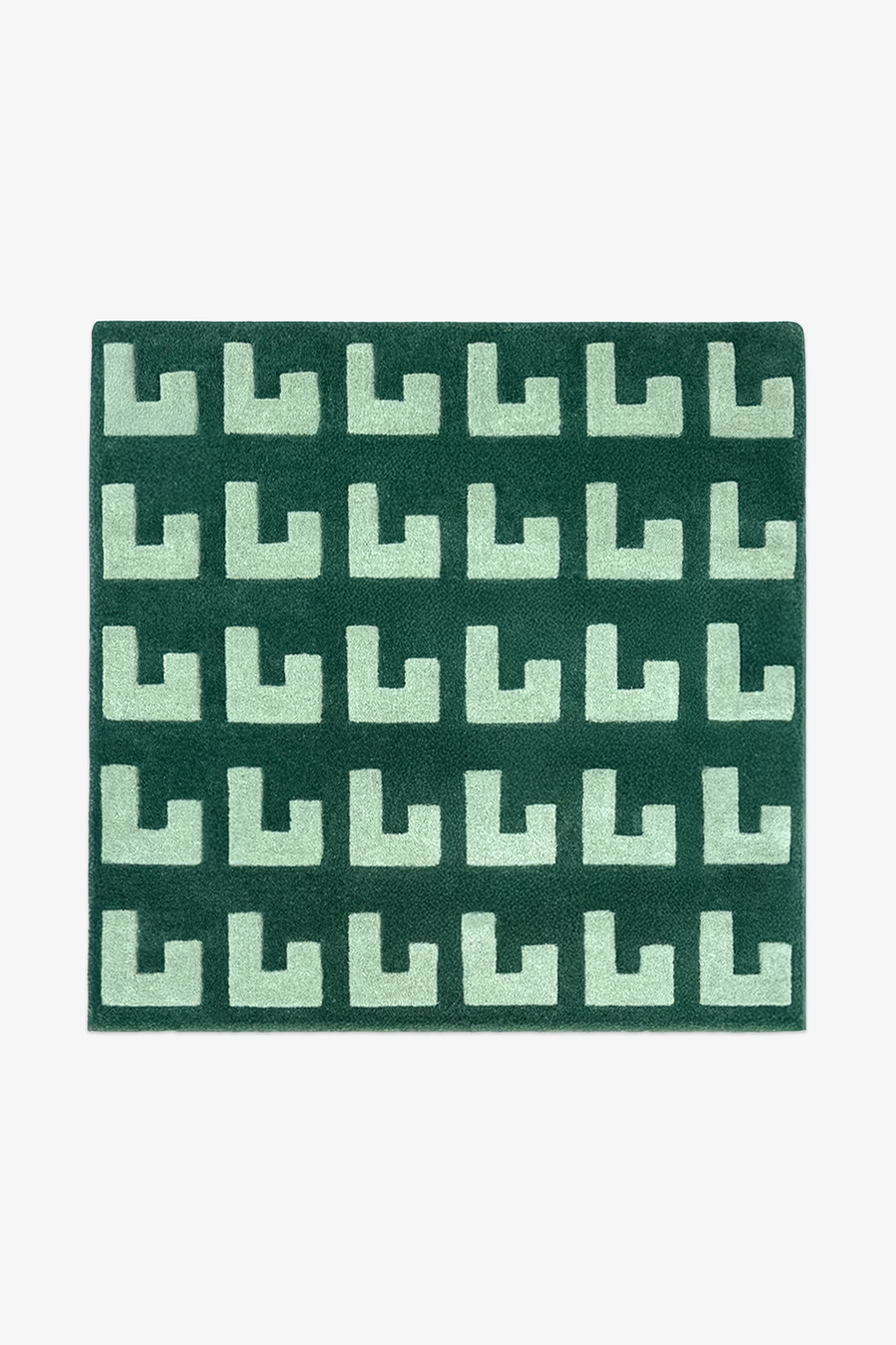 square green patterned rug on a white background