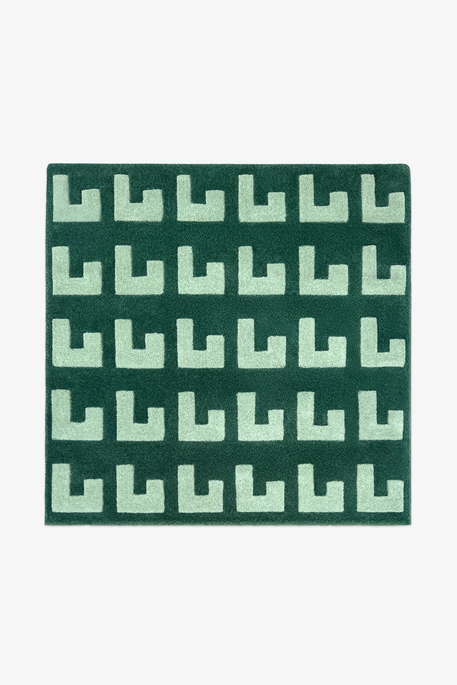 square green patterned rug on a white background