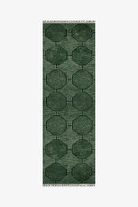 Green geometric patterned runner rug on a white background | 2x7