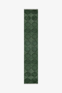 extra long runner rug with green geometric pattern and fringe ends