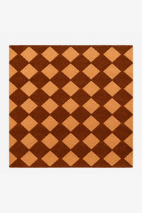 brown square wool rug with gold diamond pattern