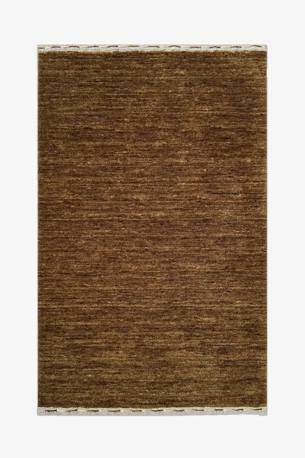 taupe golden brown textured rug on a white background