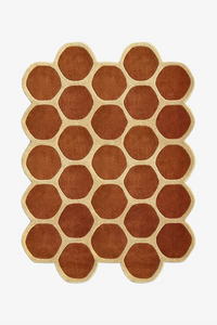 5x7 hexagonal patterned rug with brown and beige colors on a white background