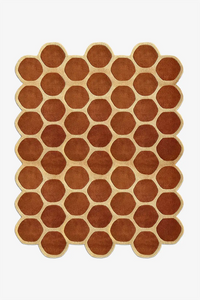8x10 brown honeycomb pattern rug with unique irregular shape on a white background