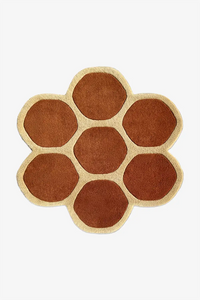 Hexagonal brown rug on a white background