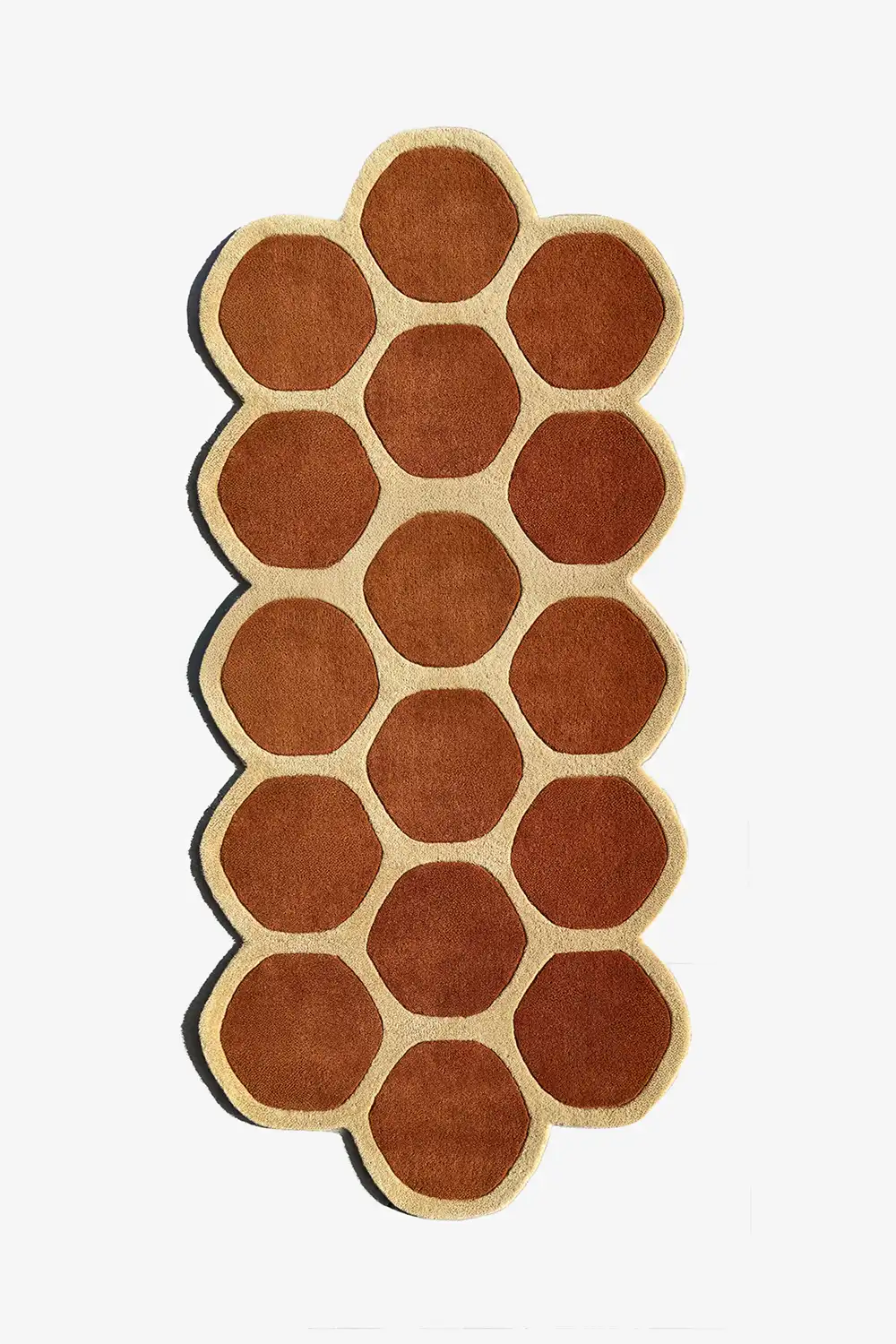 modern wool runner rug with hexagonal pattern in brown and tan on a white background