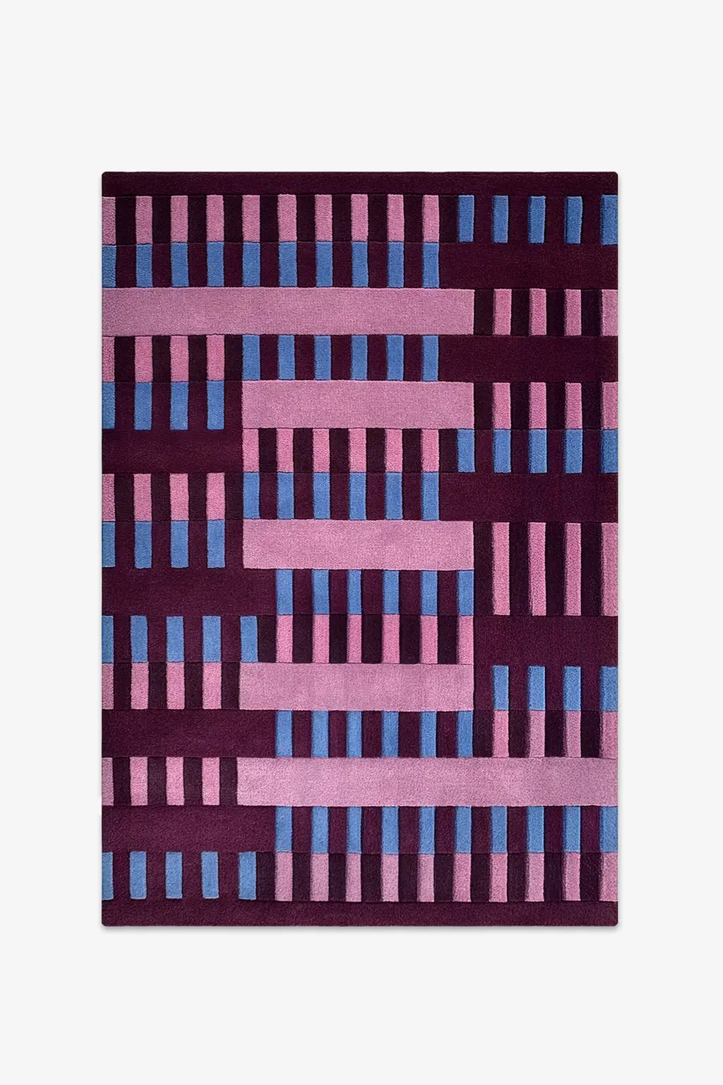 6x9 rug with a geometric pattern of pink and blue bars on a dark purple background