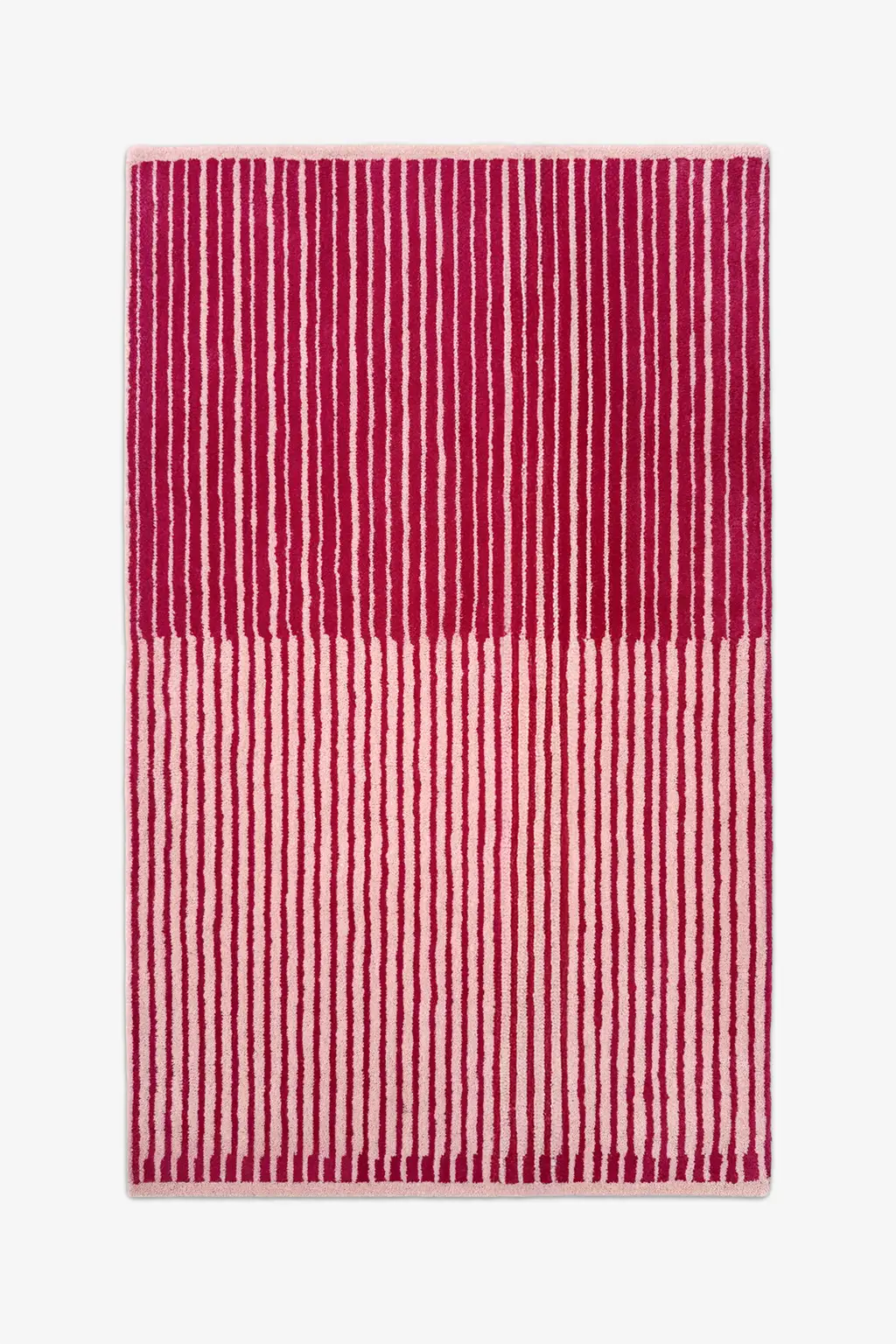 hot pink and cream striped rug with unique half tone design hand tufted in wool