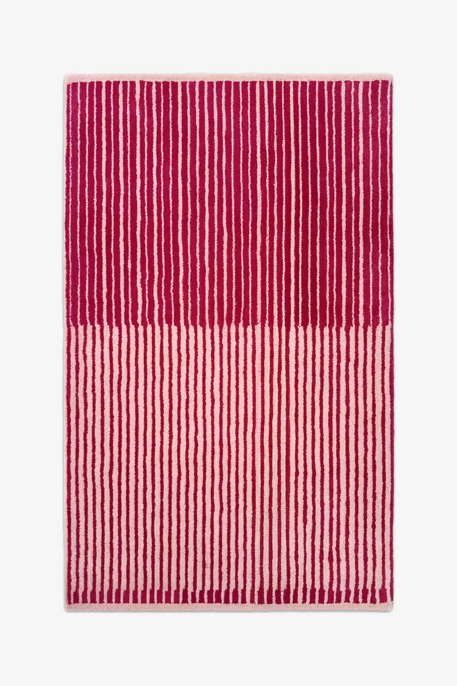 hot pink and cream striped rug with unique half tone design hand tufted in wool