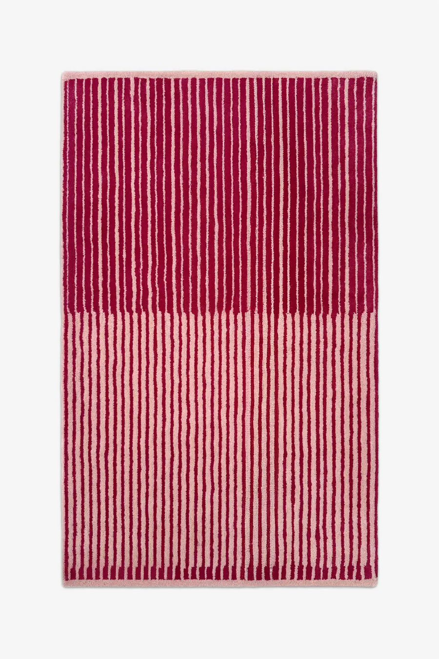 hot pink and cream striped rug with unique half tone design hand tufted in wool