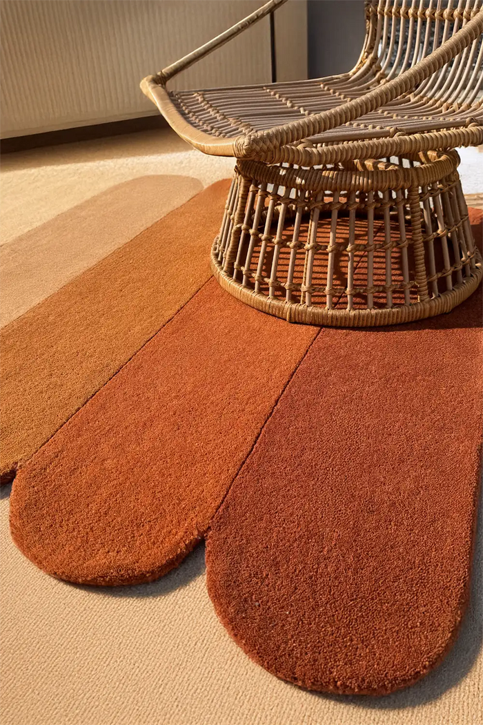 Retro-style boho rug in rich gold and rust hues, ideal as a sculpted entryway or bedroom accent rug lifestyle