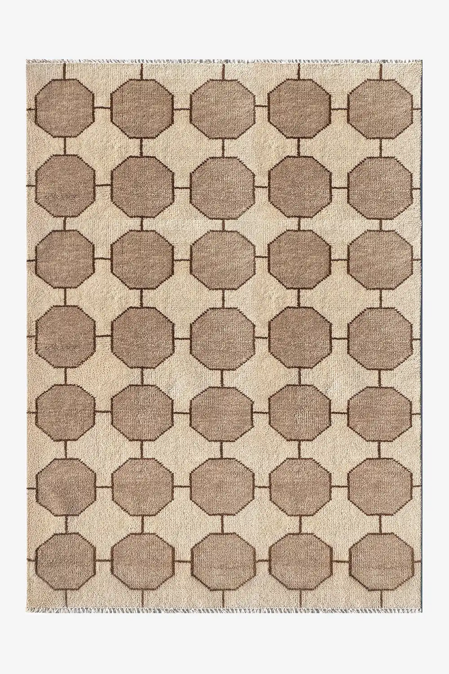 Beige and brown geometric patterned rug on a plain background