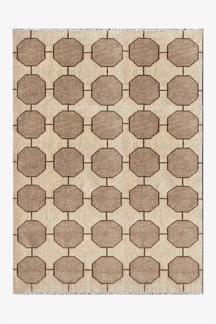 ivory beige geometric patterned rug on a plain background | 5x7