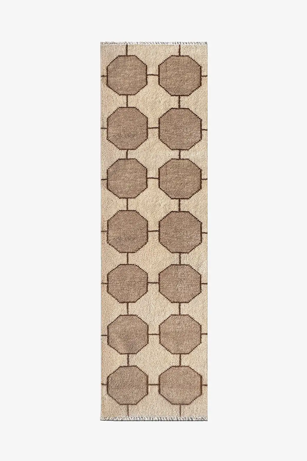 cream runner rug with geometric pattern on a plain background
