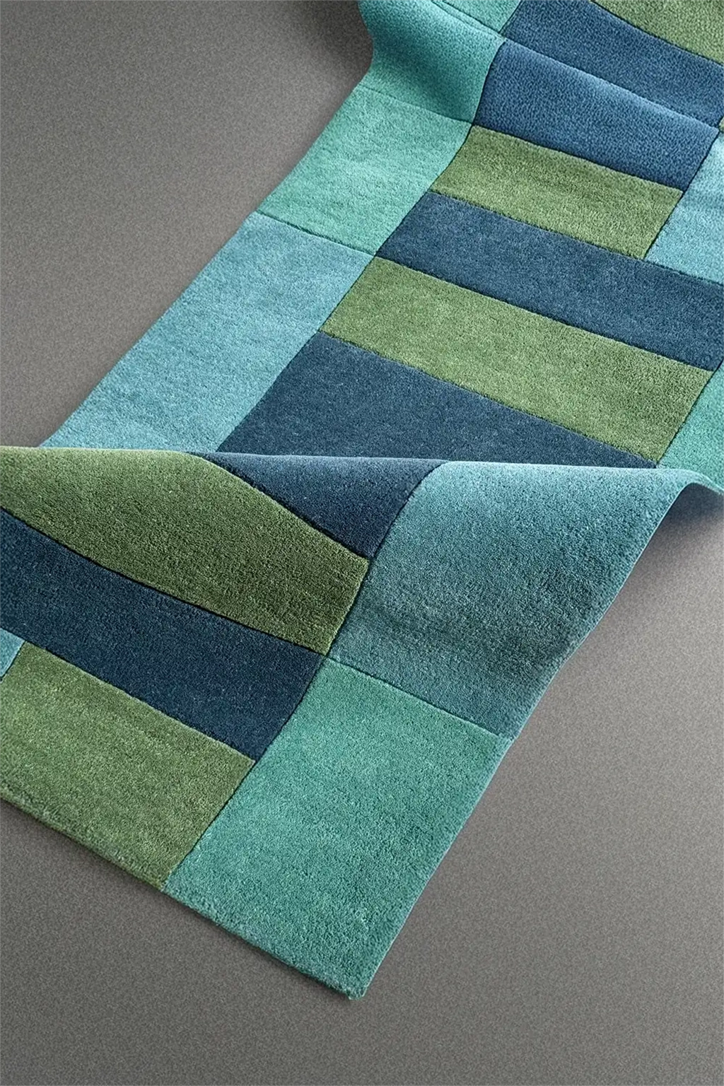 custom length runner rug with blue and green color block pattern