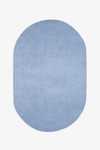 Light baby blue oval rug on a white background