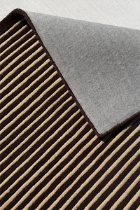 Neutral luxury wool rug with modern striped tufted pattern for elevated interiors