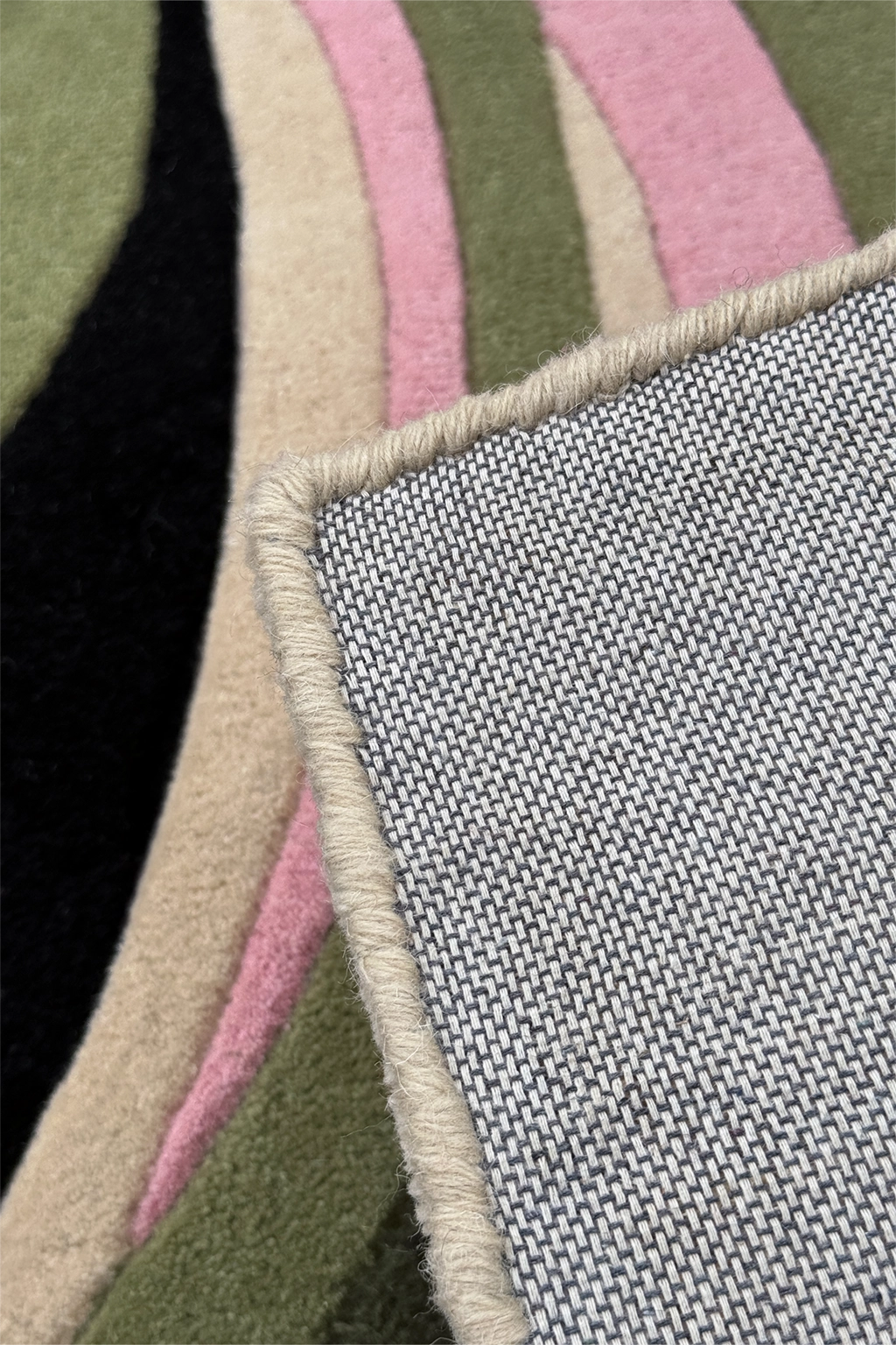 Close-up of a contemporary wool rug with a geometric pattern