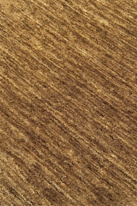 Close-up of modern ochre brown wool hand-loomed rug hazel