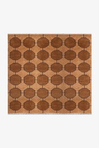 honey gold square geometric patterned rug on a white background | 6x6