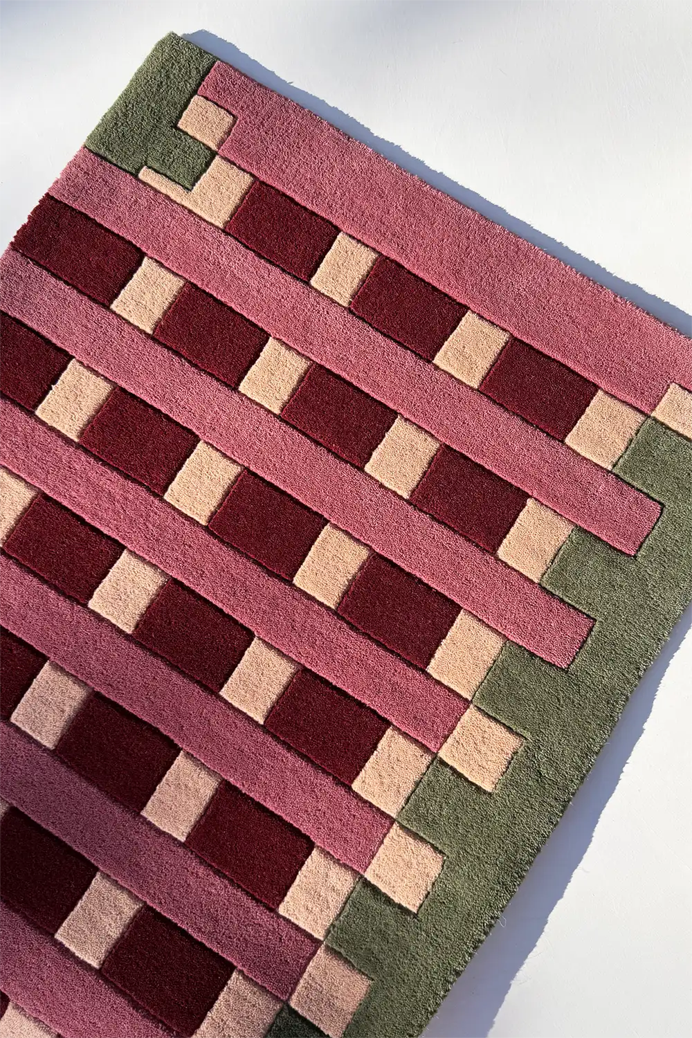 modern runner rug with a geometric pattern on a white background