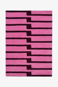 Pink and purple striped rug tufted wool rug on a white background