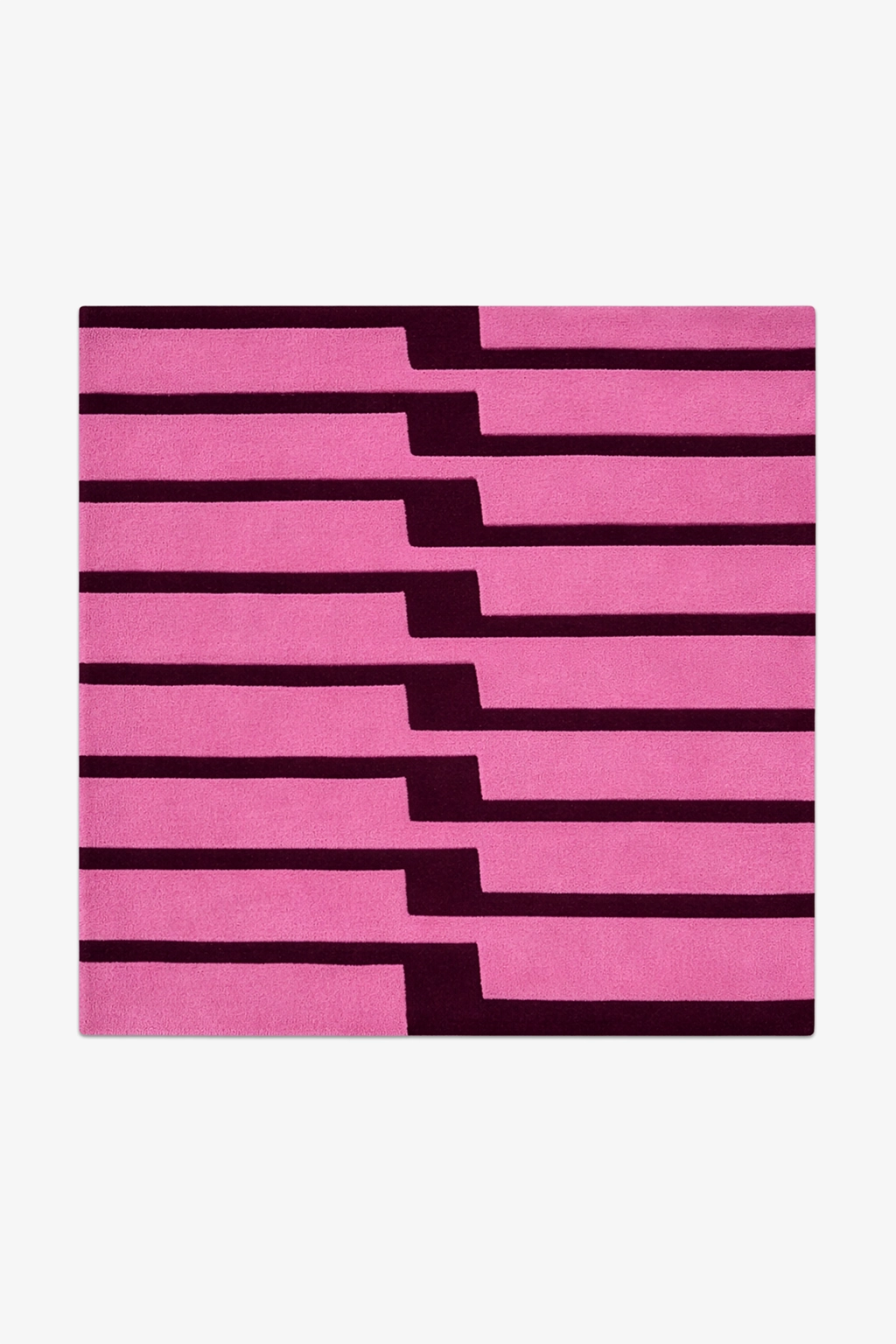 Pink striped square rug hand-tufted in wool on a white background