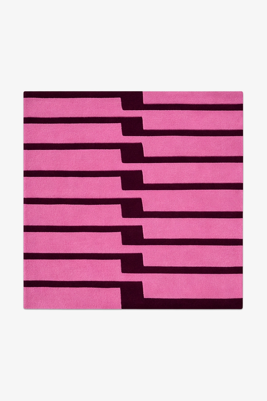 Pink striped square rug hand-tufted in wool on a white background