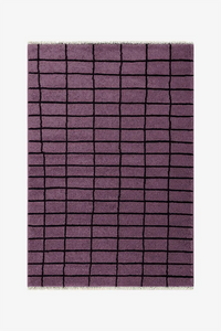 Purple checkered rug on a white background
