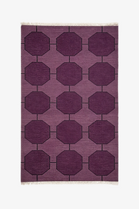 dark purple geometric patterned rug on a white background | 3x5