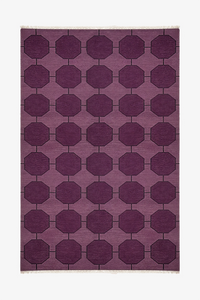 Purple geometric patterned rug made from hand-knotted wool on a white background | 5x8