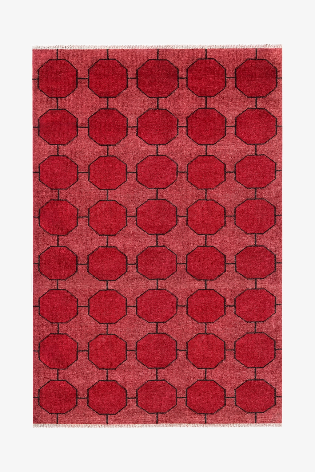 Red geometric patterned rug on a white background | 5x8