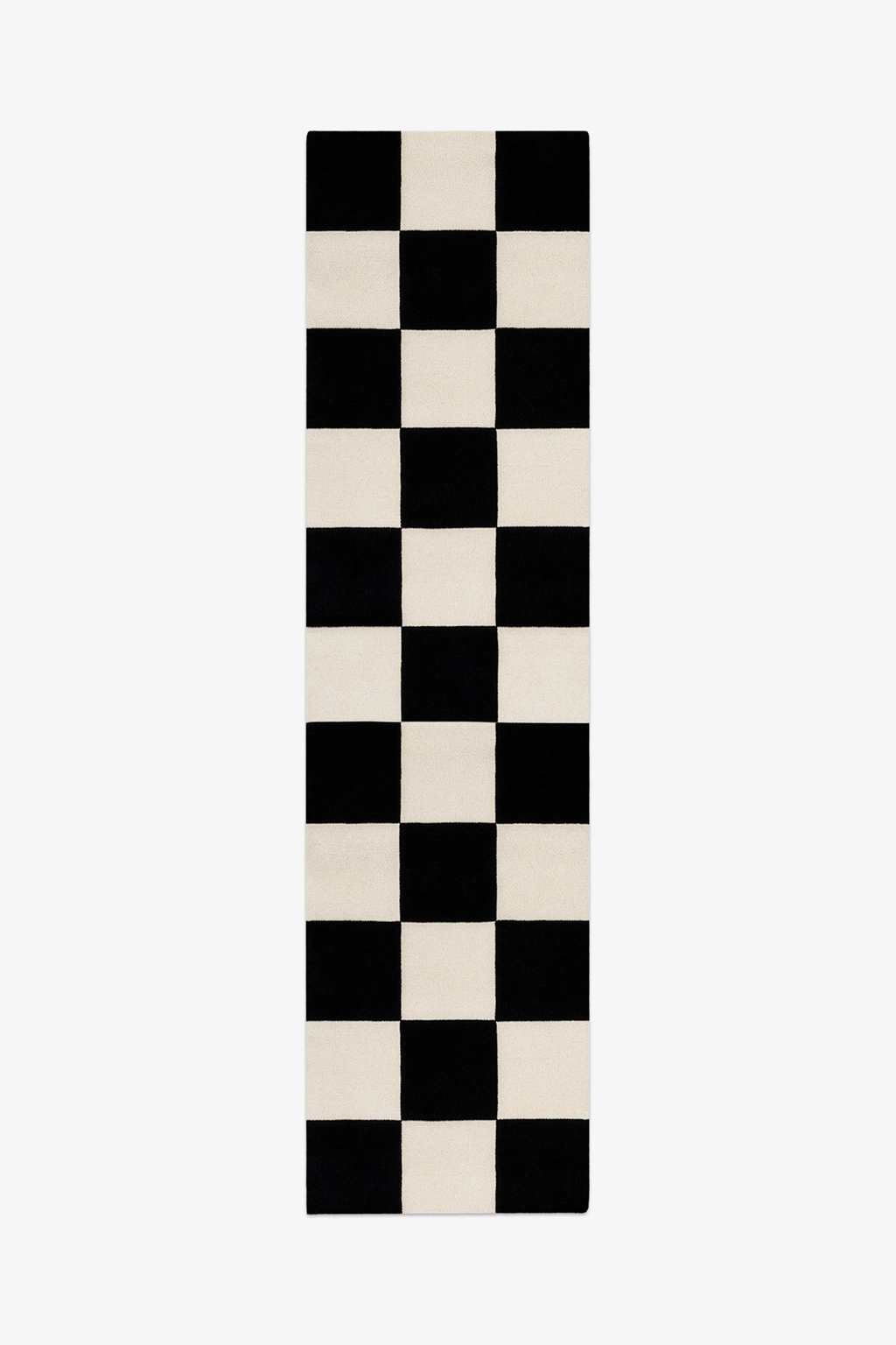 Checkered black and white runner rug on a white background