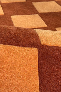 Close-up of a brown and beige checkered patterned texture