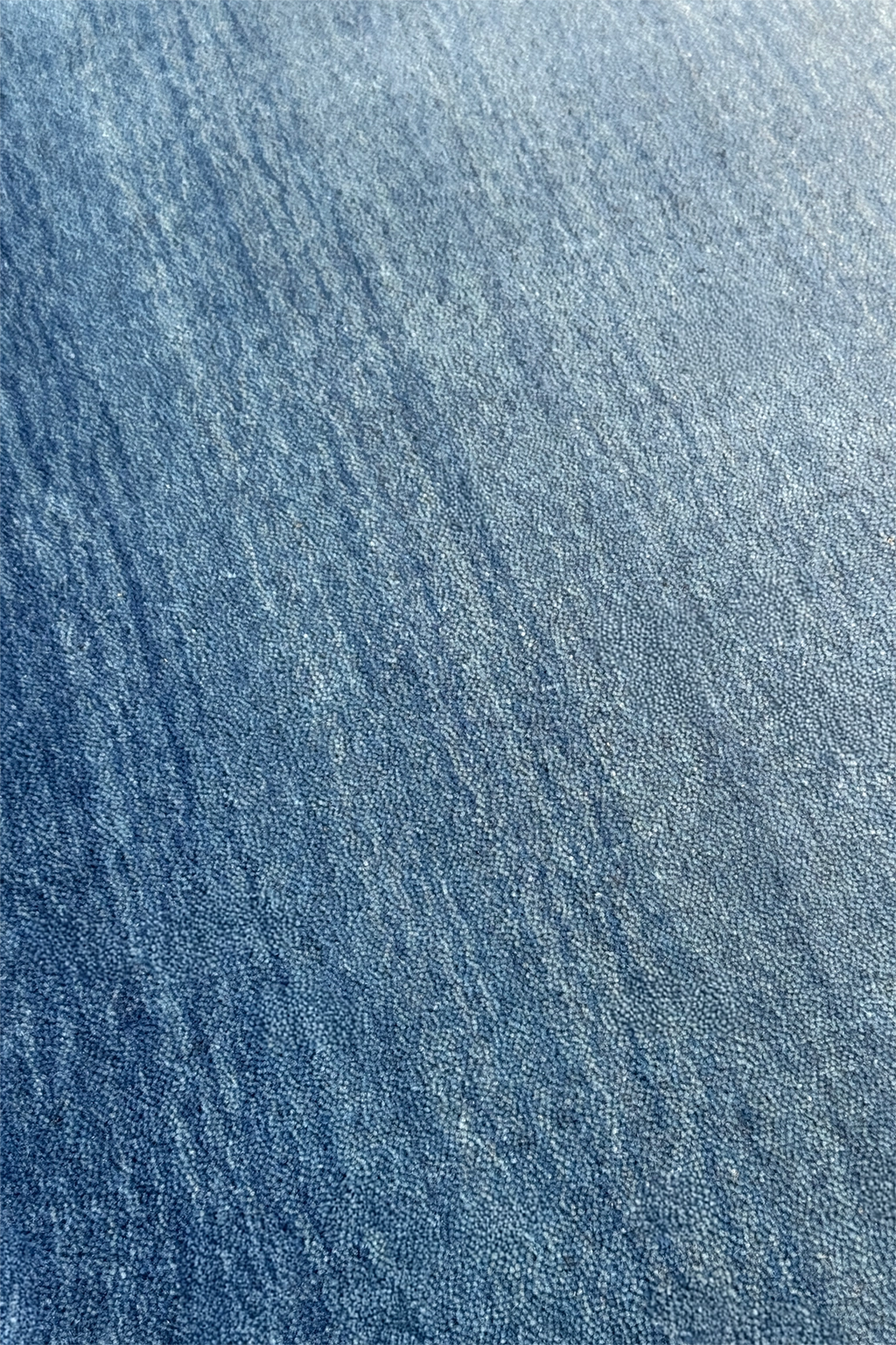Close-up of blue wool runner rug