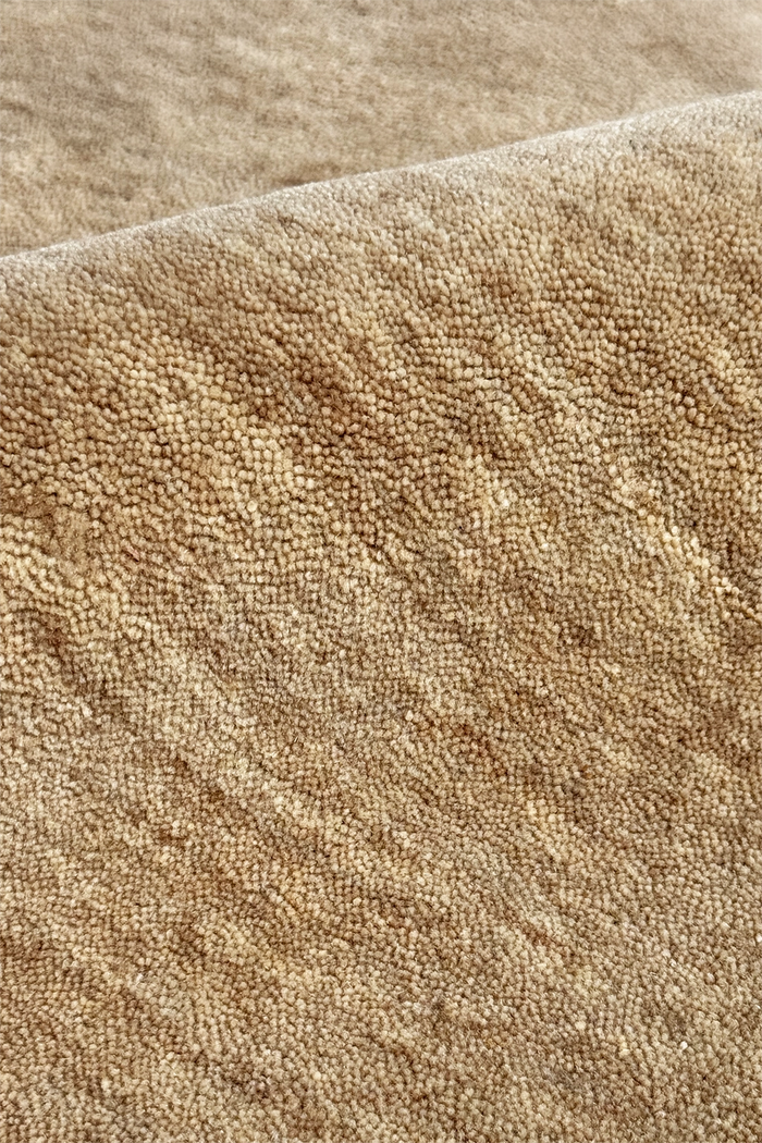 Close-up of beige carpet texture