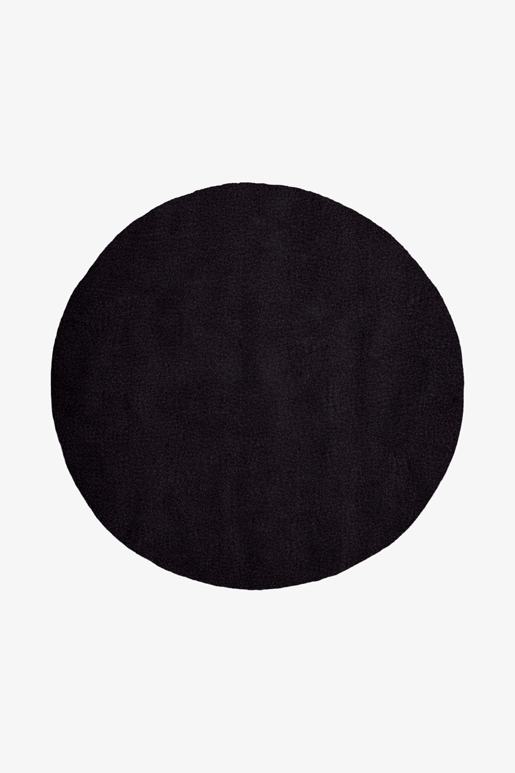 solid black round rug on a white background
