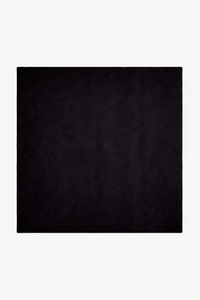 Solid black square rug hand-tufted in wool on a white background