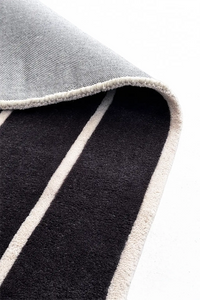 unique square rug with rounded edge black and white