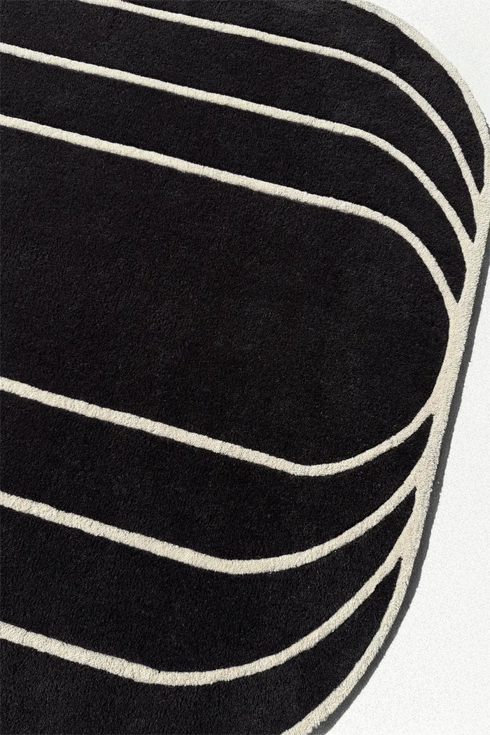 contemporary square rug in black and white stripes