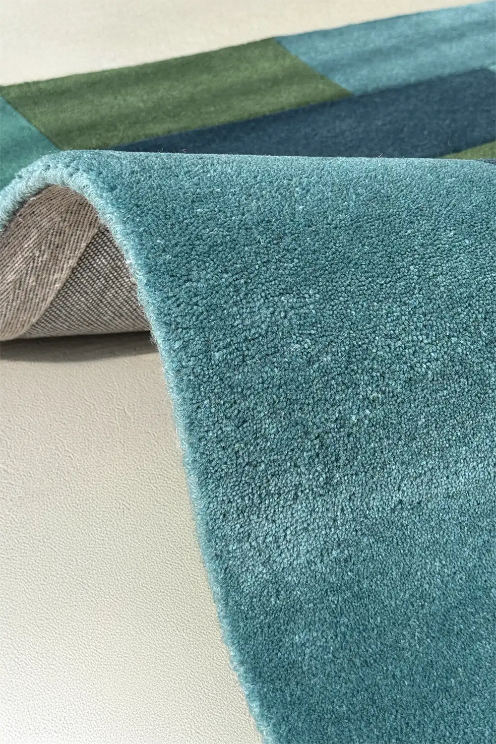 Luxurious boho area rug with thick pile and vibrant multicolor patchwork design